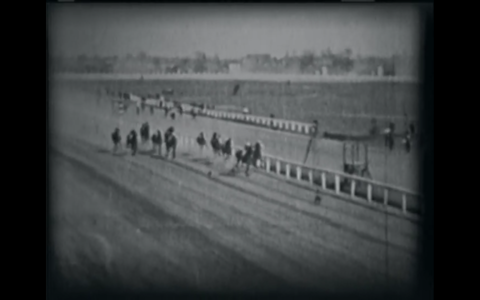 Directors of "The Kentucky Derby" film switched between shots of the actual Derby and also staged up-close shots to capture the excitement of the race. This appears to be a shot of the actual Kentucky Derby race from 1922, which was won by Morvich.