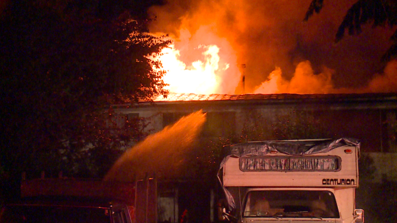 Neighbours help rescue woman from Surrey house fire that displaces family of 5