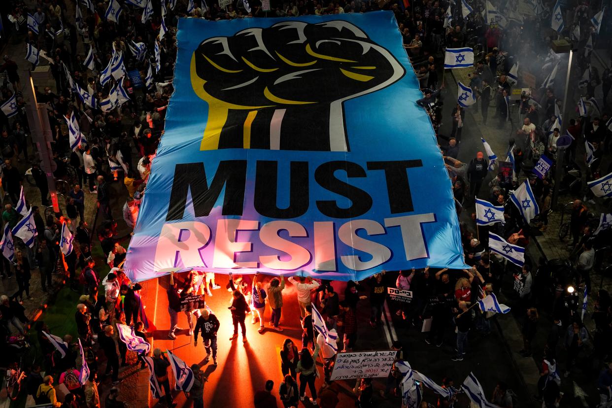 Israelis protest against plans by Prime Minister Benjamin Netanyahu’s new government to overhaul the judicial system (Copyright 2023 The Associated Press All rights reserved)