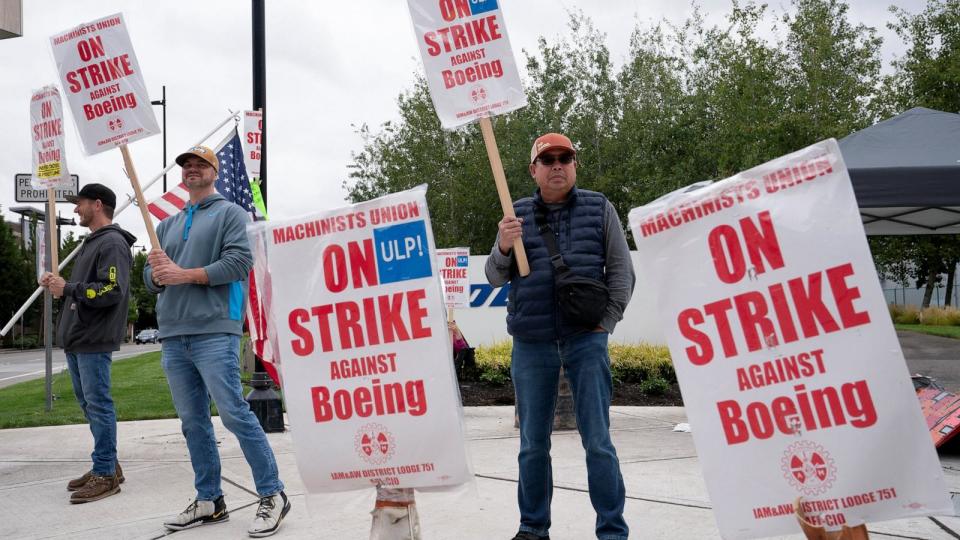 PHOTO: Boeing factory workers and supporters gather on a picket line during the third day of a strike near the entrance to a Boeing production facility in Renton, Wash., Sept. 15, 2024. (David Ryder/Reuters)