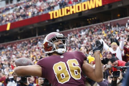 FILE PHOTO: Nov 18, 2018; Landover, MD, USA; Washington Redskins tight end Jordan Reed (86) celebrates after scoring touchdown against the Houston Texans in the third quarter at FedEx Field. Mandatory Credit: Geoff Burke-USA TODAY Sports -