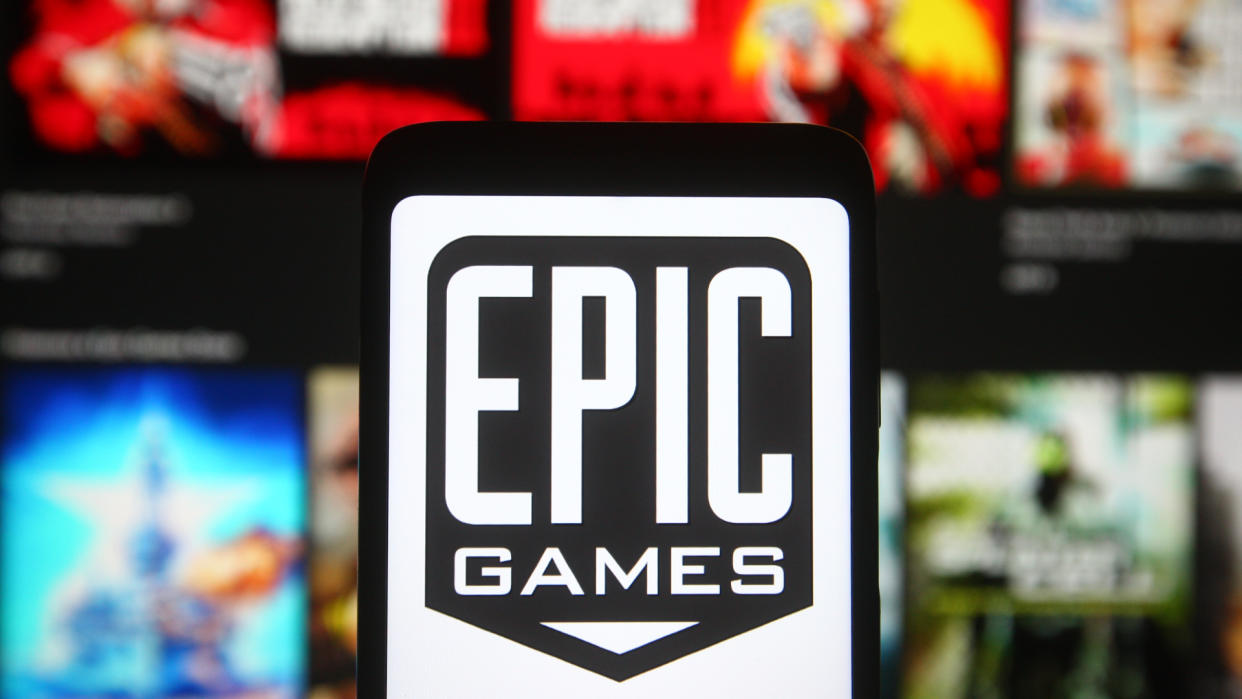  Epic Games logo behind the Epic Games Store. 