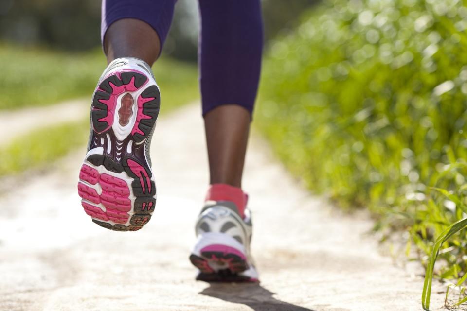Close-up of women's sport shoes running outdoors