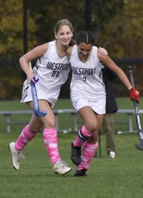 Westport's Avery Avila, right, gets congratulation from teammate MaKayla Grace after scoring a goal during Senior Day against Carver