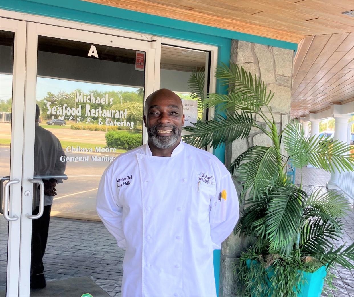 Chef Larry Fuller at Michael's Seafood Restaurant at 1206 N Lake Park Blvd. in Carolina Beach, N.C. on Aug. 11, 2023.