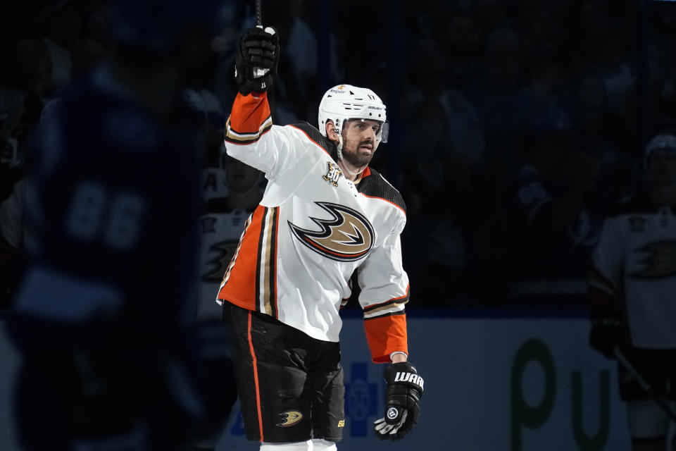 Anaheim Ducks left wing Alex Killorn waves to the fans after a video tribute during the first period of an NHL hockey game against the Tampa Bay Lightning Saturday, Jan. 13, 2024, in Tampa, Fla. Killorn won two Stanley Cups while playing for the Lightning. (AP Photo/Chris O'Meara)
