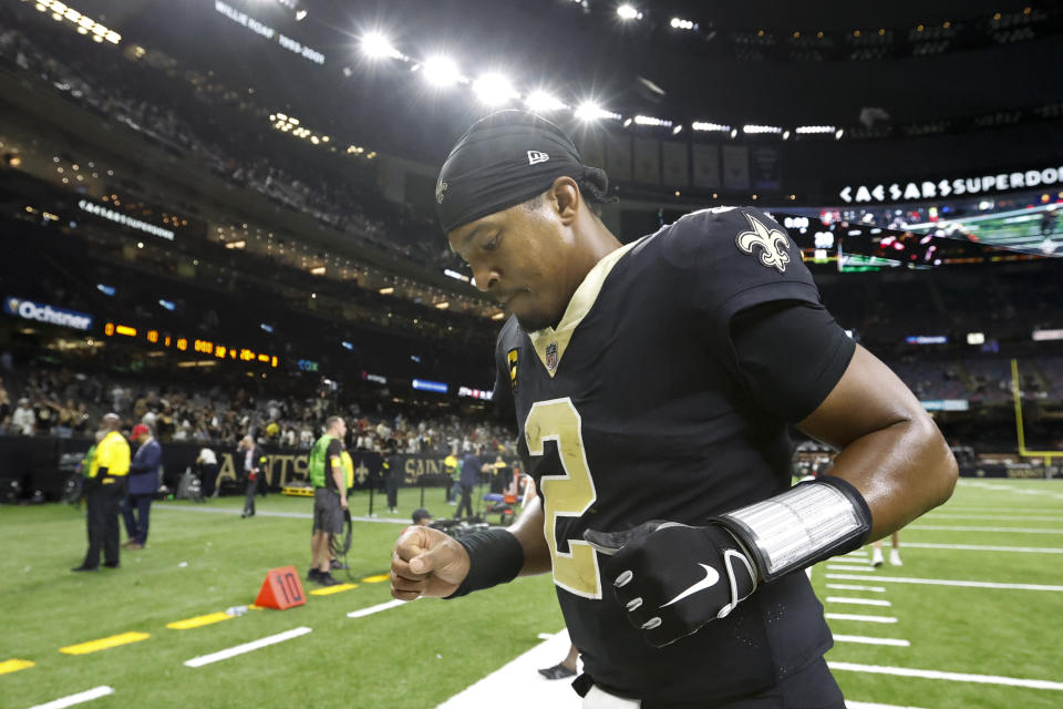 New Orleans Saints quarterback Jameis Winston leaves the field after their loss against the Tampa Bay Buccaneers during an NFL football game in New Orleans, Sunday, Sept. 18, 2022. (AP Photo/Butch Dill)