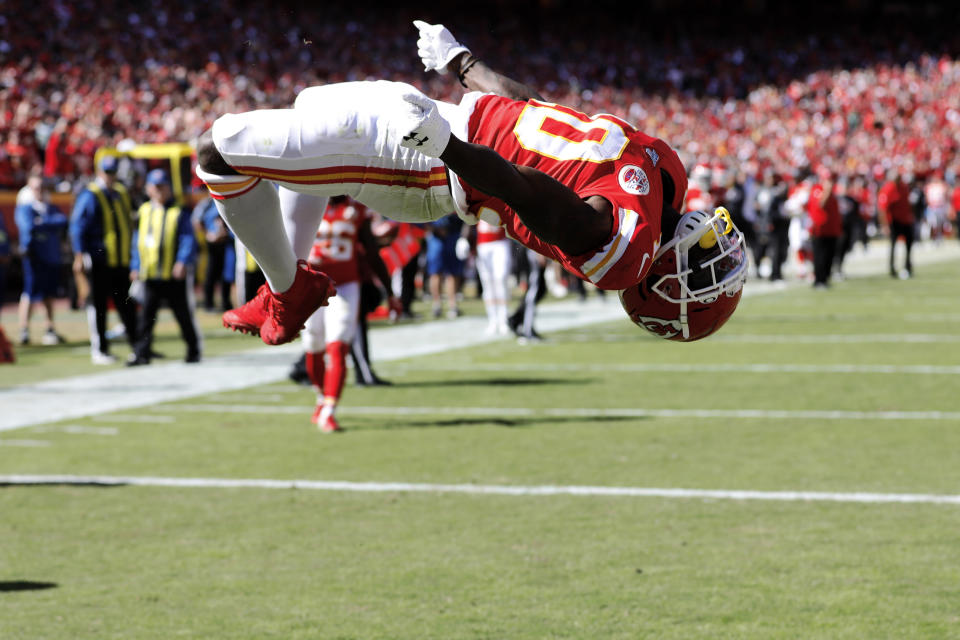 Kansas City Chiefs wide receiver Tyreek Hill (10) does a flip as he celebrates a touchdown during the second half of an NFL football game against the Houston Texans in Kansas City, Mo., Sunday, Oct. 13, 2019. (AP Photo/Colin E. Braley)