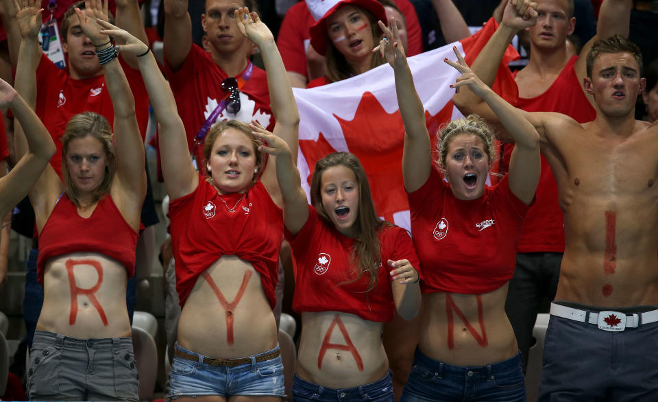 LONDON, ENGLAND - AUGUST 04: Canadian fans show their support for Ryan Cochrane of Canada in the Men's 1500m Freestyle Final on Day 8 of the London 2012 Olympic Games at the Aquatics Centre on August 4, 2012 in London, England. (Photo by Clive Rose/Getty Images)