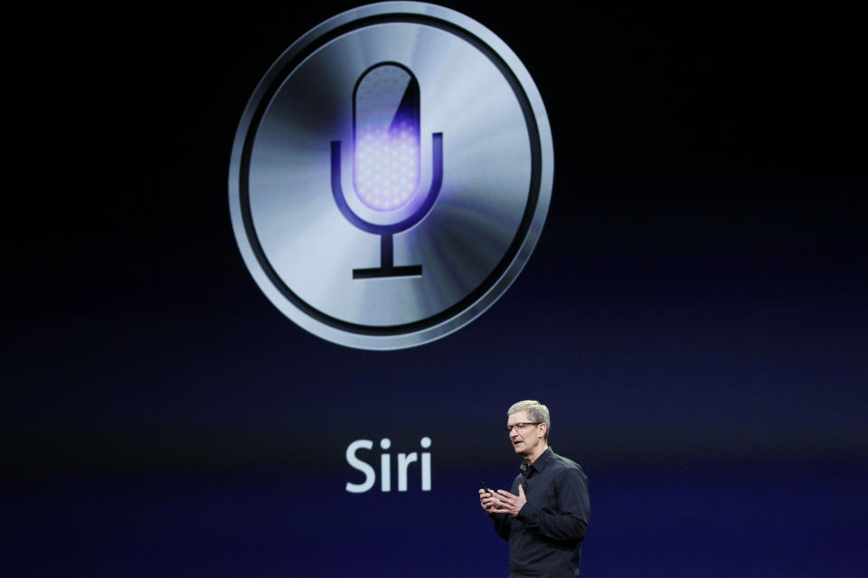 CEO Tim Cook talks about Siri during an Apple event in San Francisco, California March 7, 2012.  REUTERS/Robert Galbraith  (UNITED STATES - Tags: SCIENCE TECHNOLOGY)