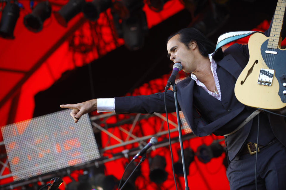 Australian Nick Cave & The Bad Seeds, perform, at the Roskilde Festival in Roskilde, Denmark, Friday, July 3, 2009. The Roskilde Festival opened Thursday. Around 75,000 guests will be listening to the 151 bands playing until Sunday evening. (AP Photo/ Tariq Mikkel Khan, Polfoto) **  DENMARK OUT  **