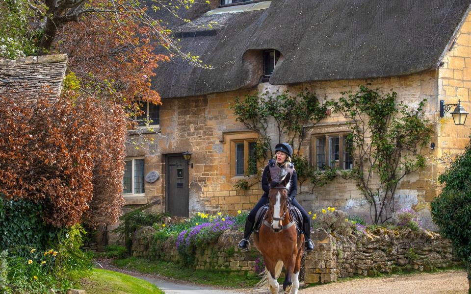 A horse rider explores Stanton - Getty