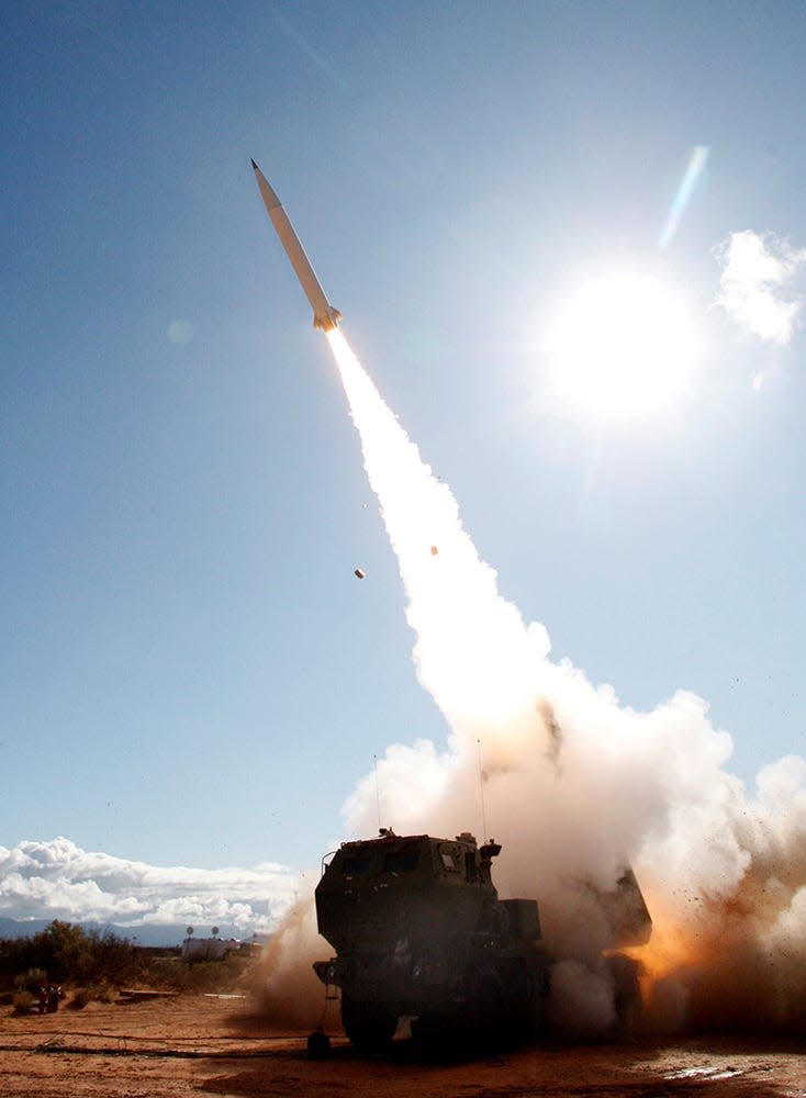 A missile is fired from a HIMARS launcher.