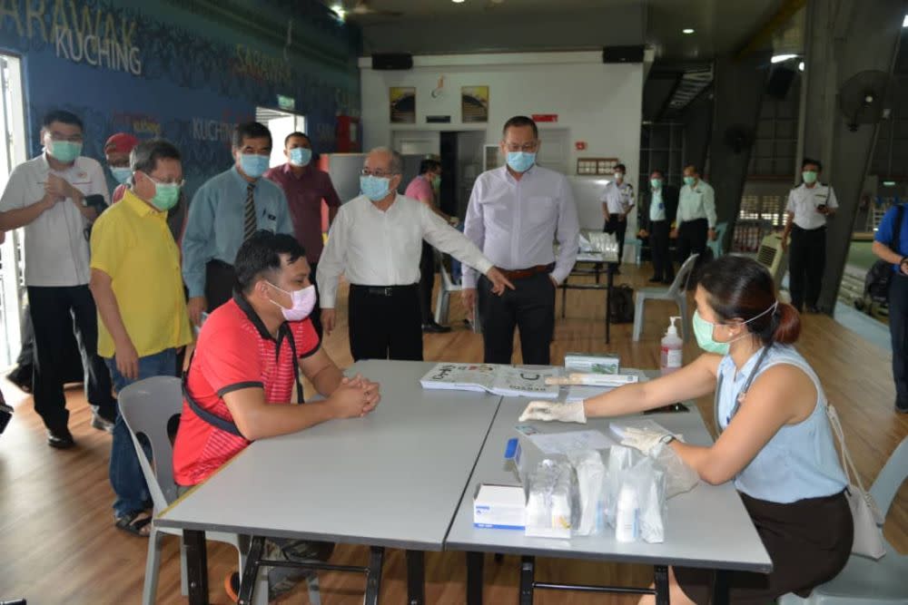 Deputy Chief Minister Datuk Amar Douglas Uggah (second from right) visits the Respiratory Clinic at the Indoor Stadium March 24, 2020. — Picture courtesy of the Deputy Chief Minister’s Office