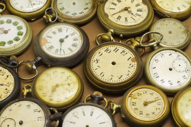 Group of antique broken clocks