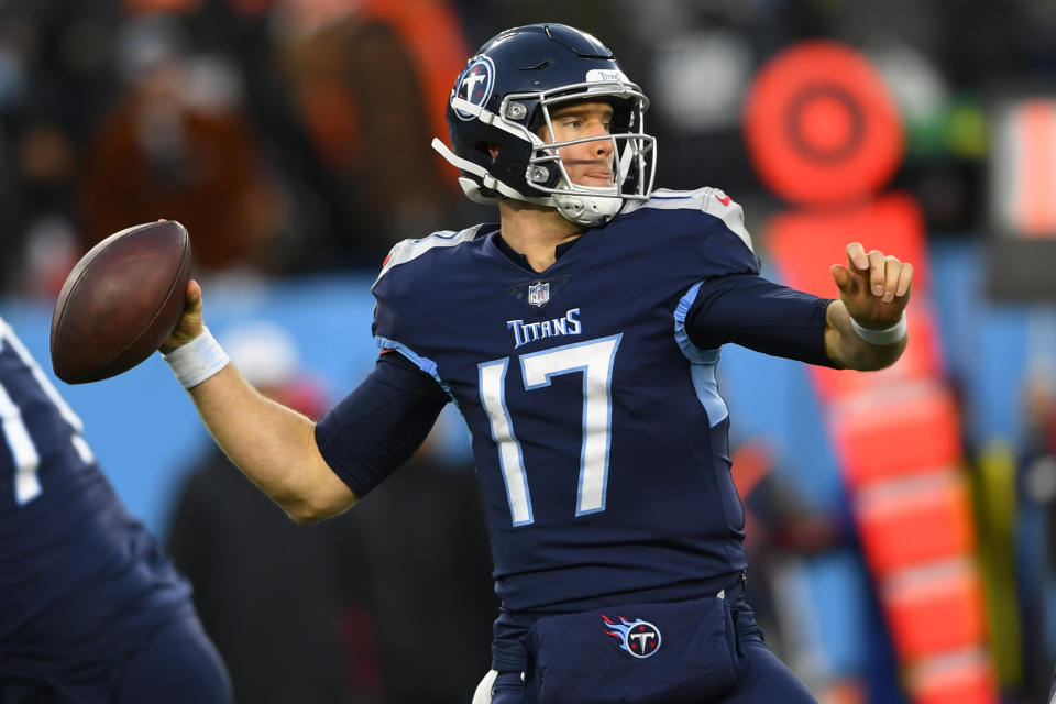 Tennessee Titans quarterback Ryan Tannehill (17) works against the Cincinnati Bengals during the first half of an NFL divisional round playoff football game, Saturday, Jan. 22, 2022, in Nashville, Tenn. (AP Photo/John Amis)