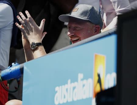 Boris Becker, the coach of Novak Djokovic of Serbia, reacts after Djokovic won his men's singles second round match against Andrey Kuznetsov of Russia at the Australian Open 2015 tennis tournament in Melbourne January 22, 2015. REUTERS/Issei Kato