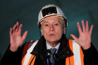 Vinci Chairman and Chief Executive Officer Xavier Huillard delivers his New Year wishes on the site of the future metro stations "Aime Cesaire" and "Mairie d'Aubervilliers" as part of the line 12 extension in Aubervilliers near Paris, France, January 16, 2018. REUTERS/Charles Platiau