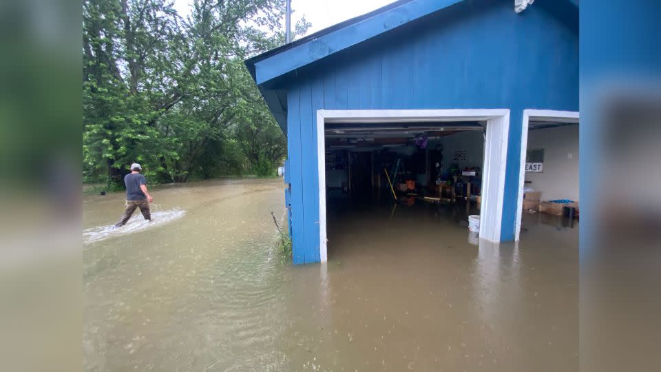 The couple's garage was also flooded during the storm. - Spenser Peterson