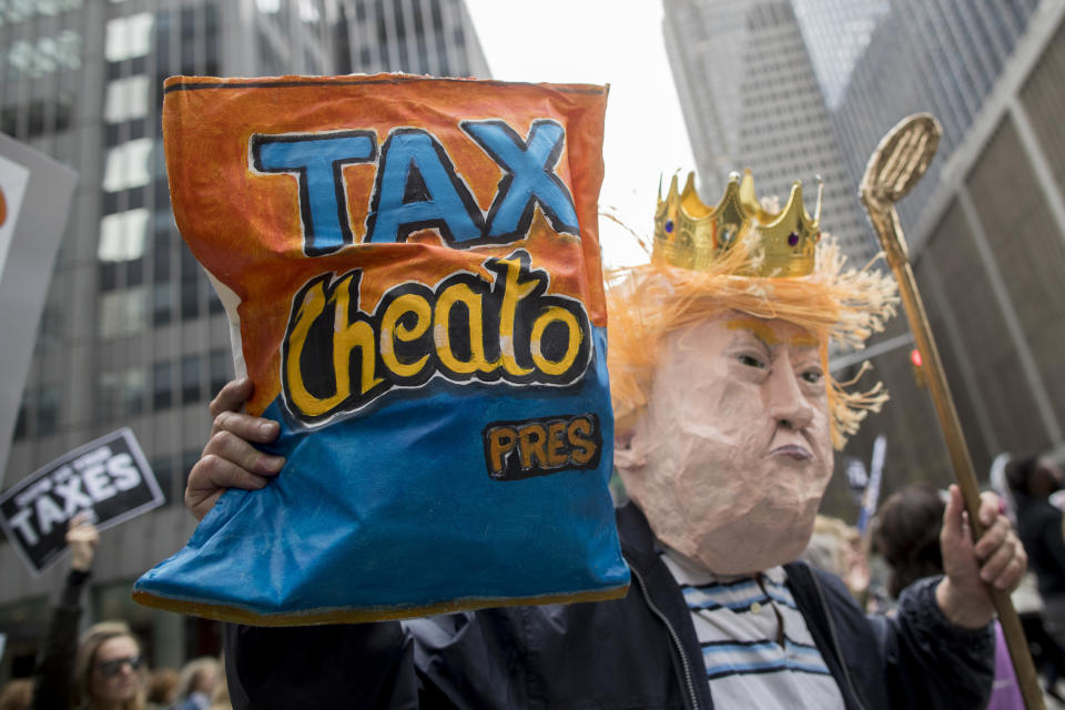 Demonstrators participate in an April 15 march and rally in New York to demand President Trump release his tax returns. (Photo: Mary Altaffer/AP)