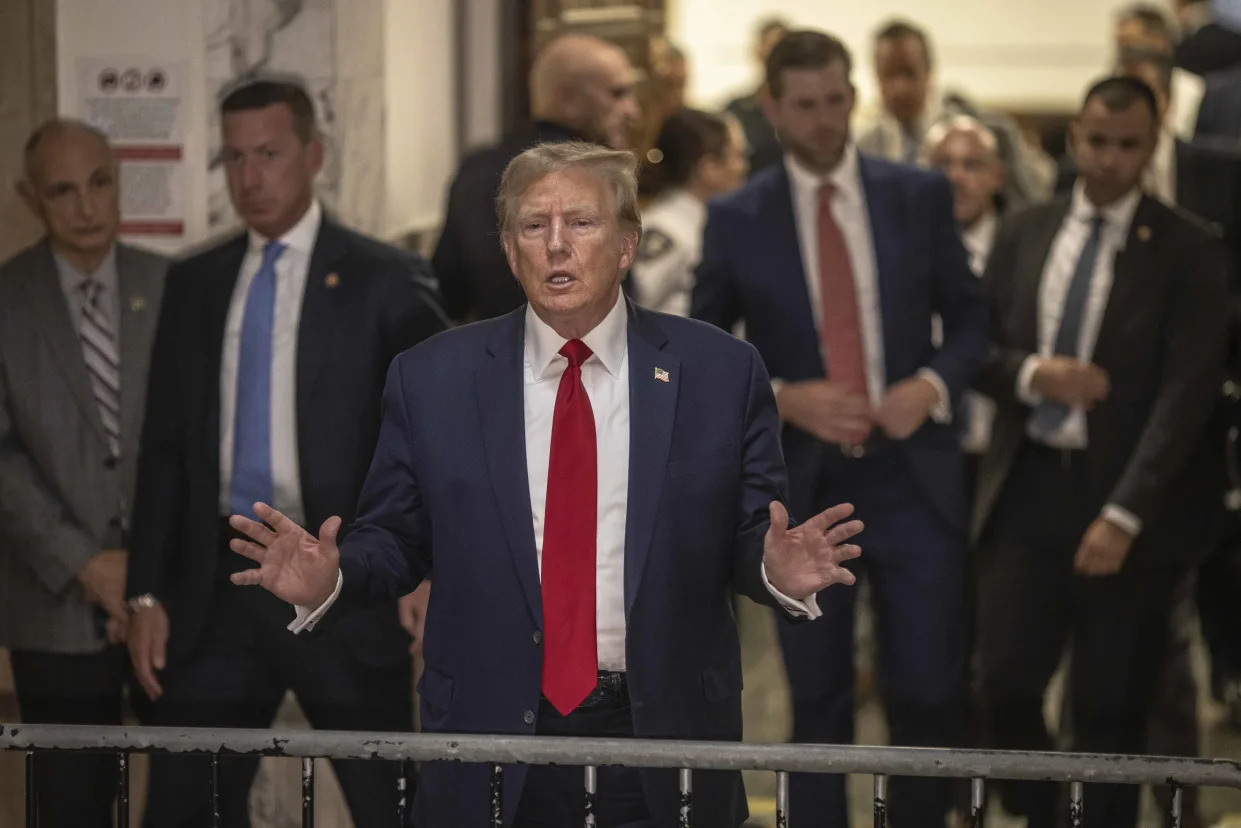 Former President Donald Trump speaks to reporters outside State Supreme court in Manhattan, Dec. 7, 2023. (Dave Sanders/The New York Times)