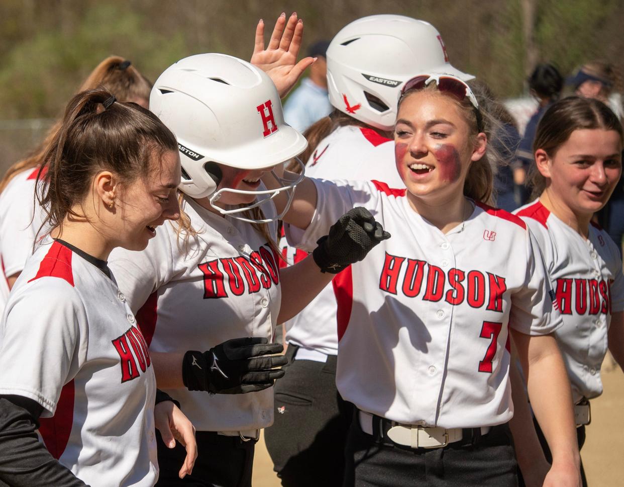 HUDSON - Hudson’s Audrey Lenox celebrates her fifth-inning home run against Shrewsbury with teammates Thursday, April 20, 2023. 