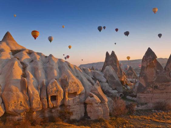 Tourism soars: hot air balloons over caves in Cappadocia (Getty)