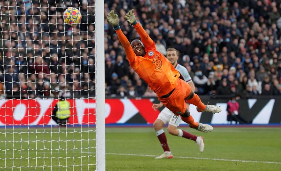 Chelsea goalkeeper Édouard Mendy dives but cannot stop a cross from Arthur Masuaku. The goal gave West Ham a 3-2 victory.