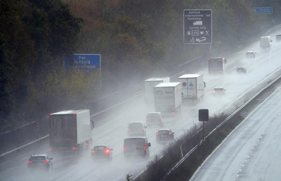 Cars and lorries drive through heavy rain on the M20 in Ashford, Kent. A week's worth of rain could fall in just a few hours across parts of the UK on Tuesday as wet weather continues to batter the country. Picture date: Tuesday November 14, 2023. (Photo by Gareth Fuller/PA Images via Getty Images)