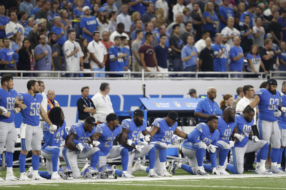 NFL players kneel during anthem as Trump fumes