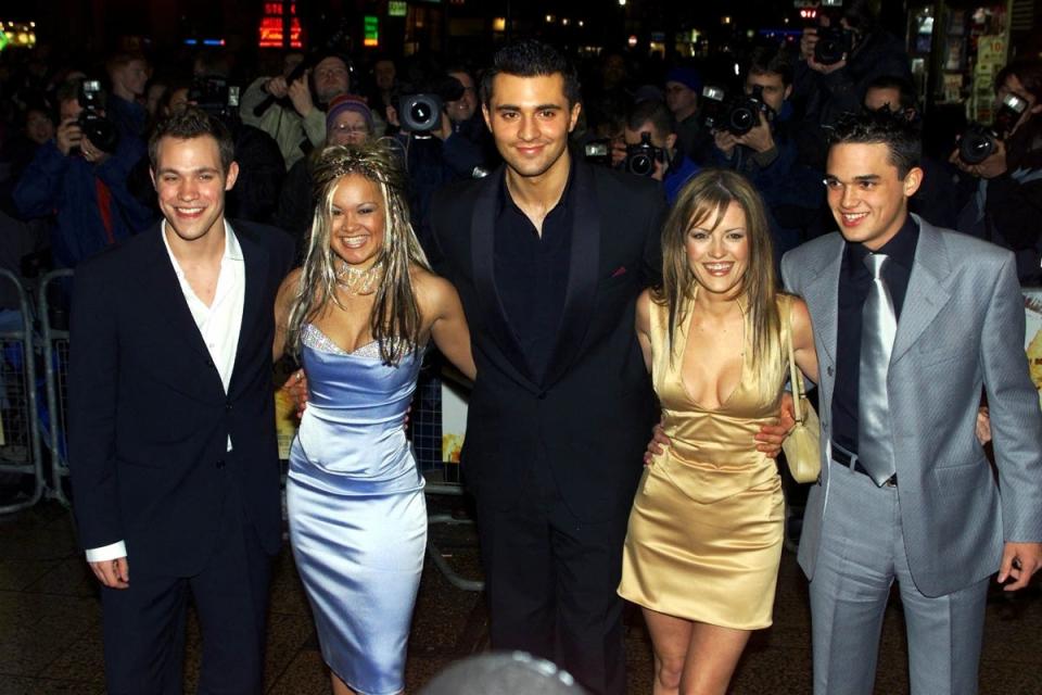 Danesh (centre) with his fellow Pop Idols stars, including Gareth Gates (far left) and Will Smith (far right) in 2002 (Reuters)