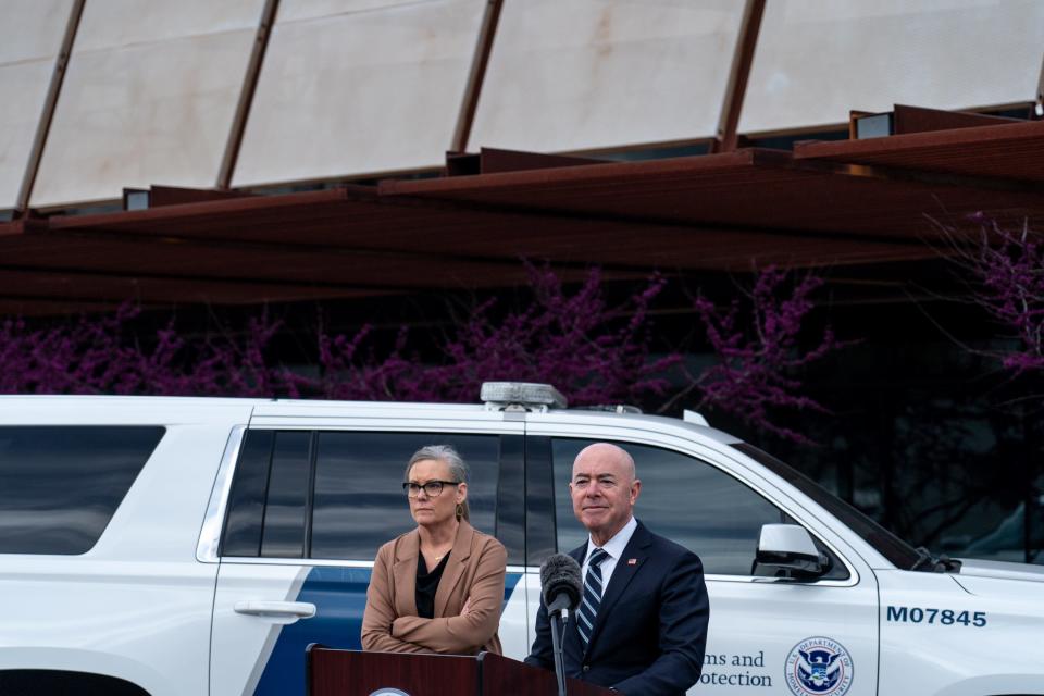 Arizona Governor Katie Hobbs, left, and Secretary of the Department of Homeland Security Alejandro N. Mayorkas, right, attend a press conference at the U.S. Customs and Border Protection Mariposa Port of Entry in Nogales on March 21, 2023.