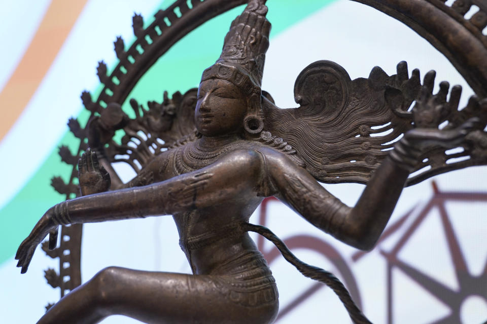 Some of the stolen objects being returned to India, including this bronze Shiva Nataraja valued at $4 million, are displayed during a ceremony at the Indian consulate in New York, Thursday, Oct. 28, 2021. U.S. authorities have returned about 250 antiquities to India in a long-running investigation of a stolen art scheme. The items, worth an estimated $15 million, were handed over on Thursday during a ceremony at the Indian consulate in New York City. (AP Photo/Seth Wenig)