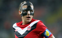 DRESDEN, GERMANY - JULY 05: Christine Sinclair of Canada looks on during the FIFA Women's World Cup 2011 Group A match between Canada and Nigeria at Rudolf-Harbig-Stadion on July 5, 2011 in Dresden, Germany. (Photo by Martin Rose/Getty Images)