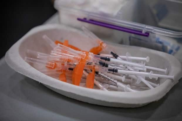 Syringes with COVID-19 vaccine in them are pictured at a clinic in Metro Vancouver on March 25. (Ben Nelms/CBC - image credit)