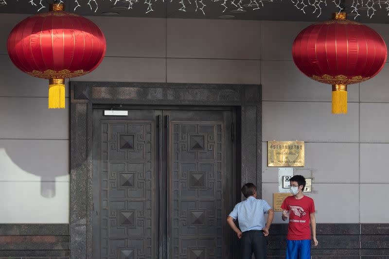 Men try to gain access into the China Consulate General in Houston, Texas