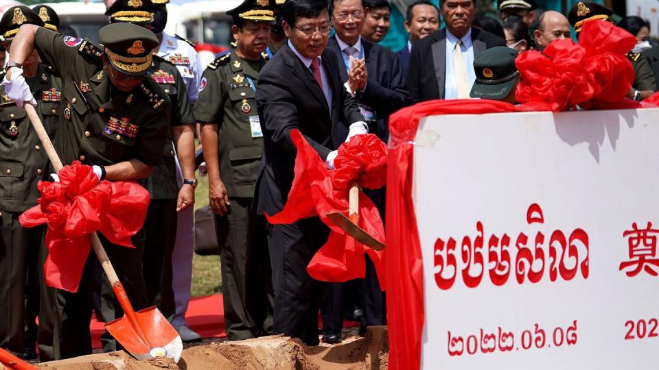 Cambodian Defence Minister Tea Banh, left, and China's Ambassador to Cambodia Wang Wentian, center, take part in a groundbreaking ceremony at the Ream Naval Base in Preah Sihanouk province on June 8, 2022. (Pann Bony/AFP via Getty Images)