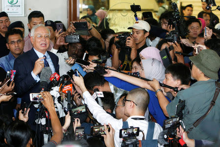 Malaysia's former Prime Minister Najib Razak speaks to journalists as he leaves a court in Kuala Lumpur, Malaysia September 20, 2018. REUTERS/Lai Seng Sin