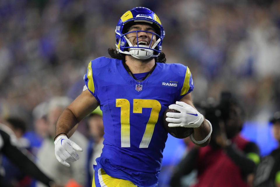 Los Angeles Rams wide receiver Puka Nacua smiles after a reception during the second half of an NFL football game against the New Orleans Saints, Thursday, Dec. 21, 2023, in Inglewood, Calif. (AP Photo/Ashley Landis)