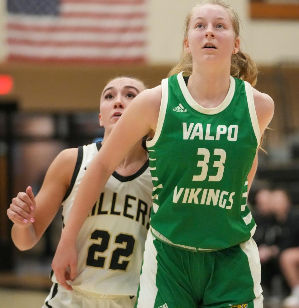 Noblesville High School's Reagan Wilson (22) and Valparaiso High School's Becca Gerdt (33) watch free throws at Noblesville High School, Dec 28, 2023. Noblesville won 65-56.