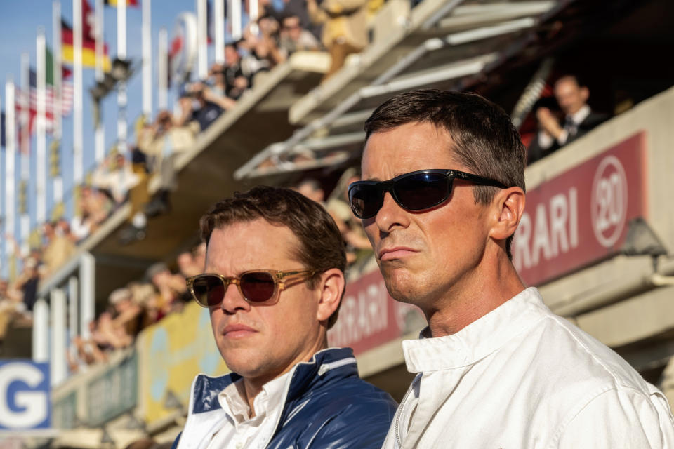 This image released by 20th Century Fox shows Christian Bale, right, and Matt Damon in a scene from the film, "Ford v. Ferrari." (Merrick Morton/20th Century Fox via AP)