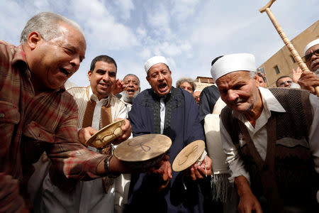 Libyan Sufi Muslims chant and beat drums during a procession to commemorate Prophet Mohammad's birthday, also known as Mawlid, in the old city of the Libyan capital Tripoli, Libya November 20, 2018. REUTERS/Ismail Zitouny