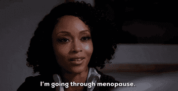 A GIF from "Chicago Med" of a female patient exclaiming, "I'm going through menopause"