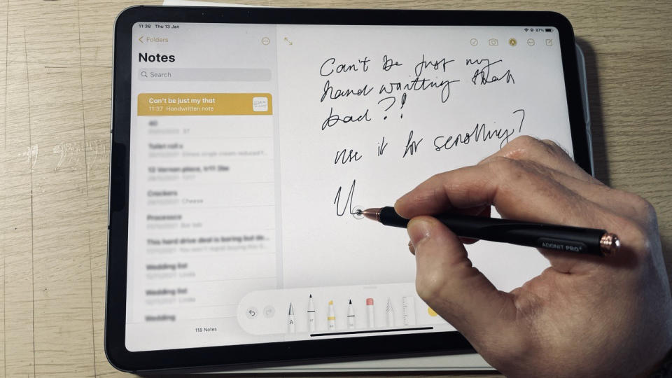 Our reviewer writing on a screen with Adonit Pro 4, one of the best Apple Pencil alternatives