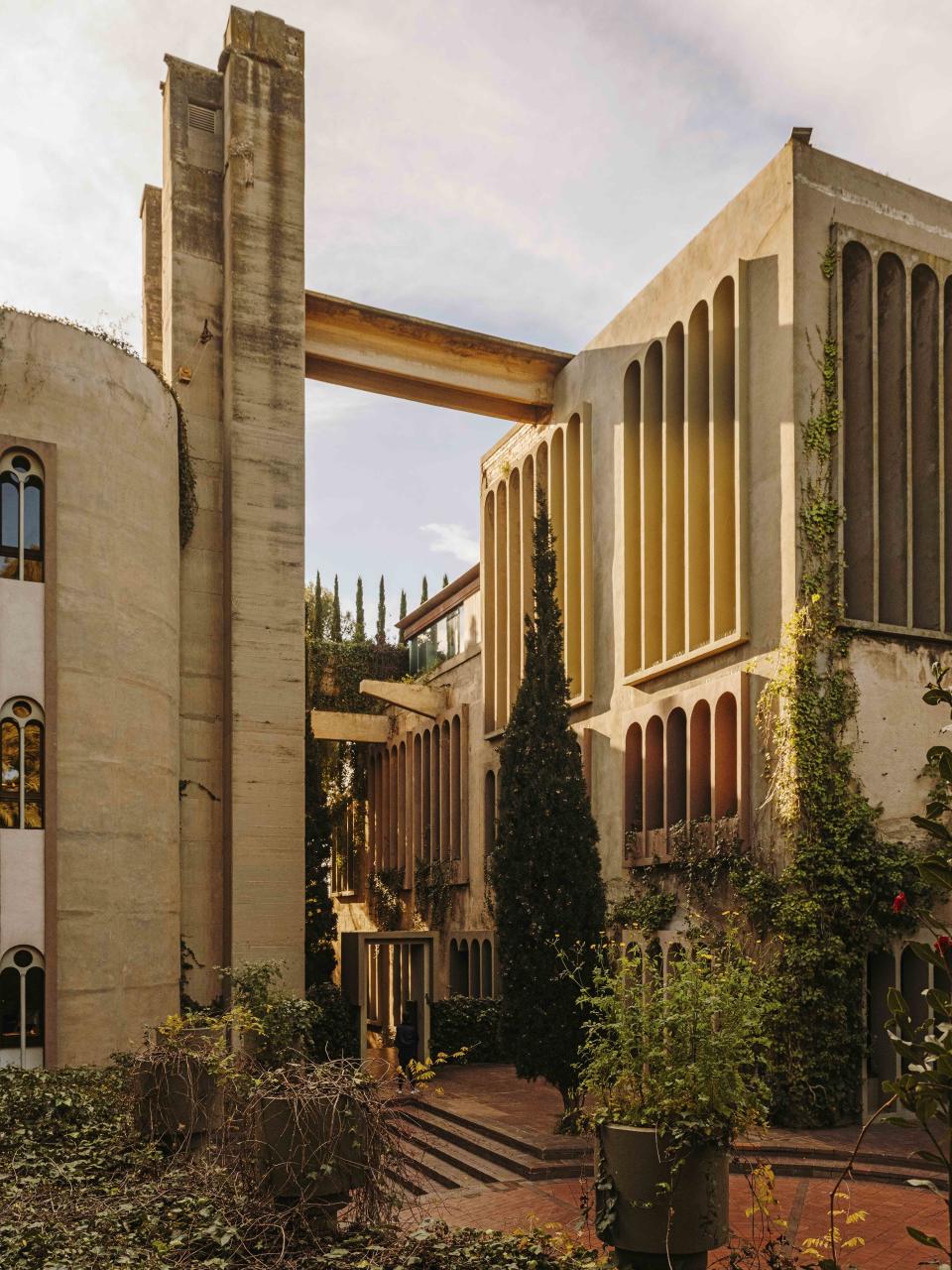 The headquarters of Ricardo Bofill Taller de Arquitectura, called La Fábrica, are located in a formerly abandoned concrete factory in Sant Just Desvern, Spain. Bofill moved his practice into the space in 1975, converting it into a facility that looks like a futuristic ruin.