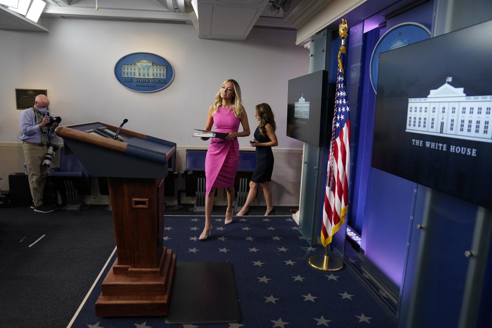 White House press secretary Kayleigh McEnany arrives for a press briefing at the White House, Wednesday, Sept. 9, 2020, in Washington. (AP Photo/Evan Vucci)