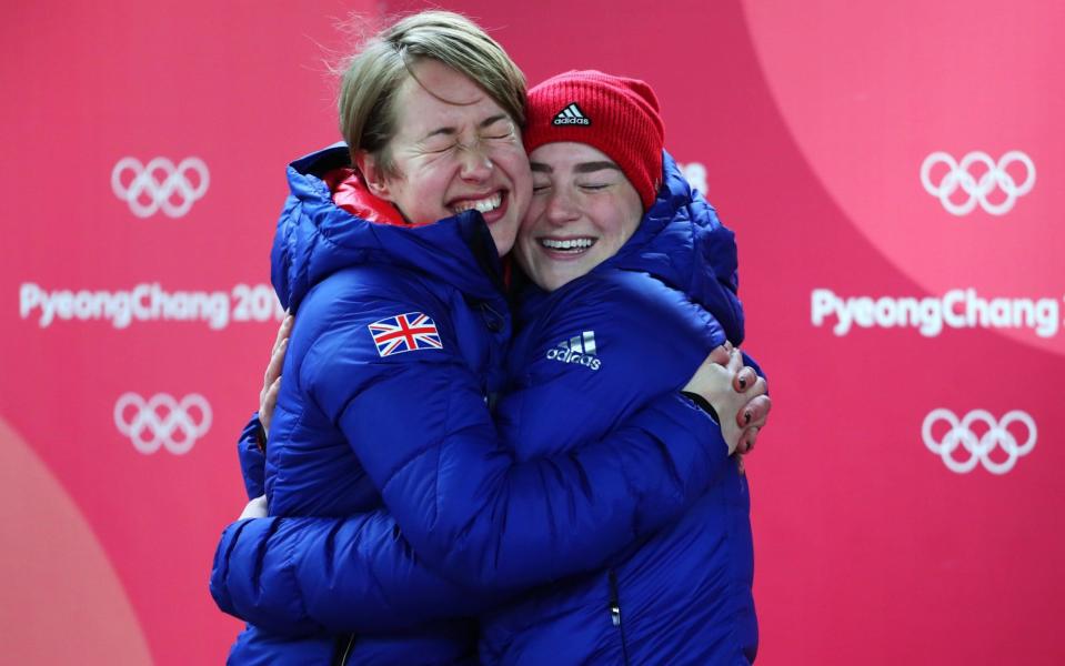 Lizzy Yarnold (left) and Laura Deas (right) celebrate their medal success - Getty Images AsiaPac