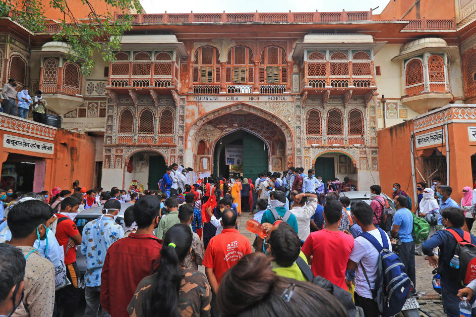 Students Crowd Outside An Examination Centre In Jaipur