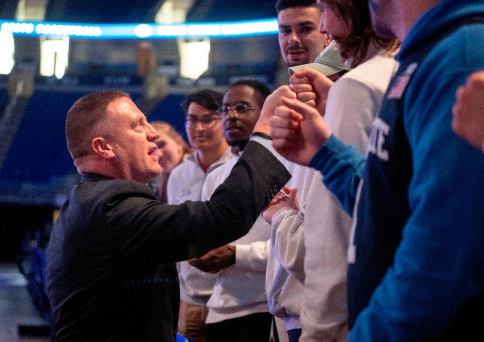 Penn State’s new men’s basketball coach Mike Rhoades greets students from the Legion of Blue after his introductory press conference on Thursday, March 30, 2023.