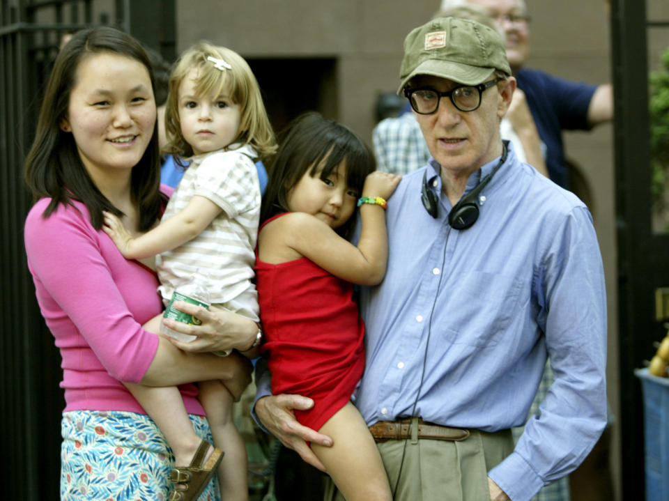 Soon-Yi Previn and Woody Allen with kids.